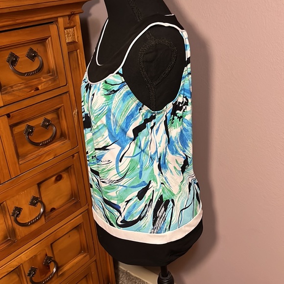 This is a blue abstractly patterned tank top with black trim - Picture 2 of 5